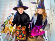 Trick or Treaters Over Age 12 Face Potential Jail Time in Chesapeake, Va Happy children in a costumes of witches and wizards celebrating halloween. Trick or treat. Halloween party.