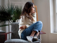 What Teens Need to Stay Sane (And Fun to be Around) Sad thoughtful teen girl sits on chair feels depressed, offended or lonely, upset young woman suffers from abuse, harassment or heartbreak, grieving lady or violence victim has psychological problem