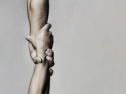 We Are Raising a Generation of Cynical Young Codgers Helping hand concept and international day of peace, support. Helping hand outstretched, isolated arm, salvation. Close up help hand. Two hands, helping arm of a friend, teamwork. Black and white.