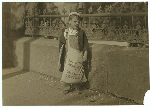 Boy age 5 or 6 selling Saturday Evening Post in Sacramento, 1915