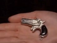 Suspended for a Keychain toy gun