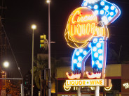 This has got to be the weirdest liquor store sign available on Google Images. Also, please read the story above. (CREDIT: OLYMPUS DIGITAL CAMERA)