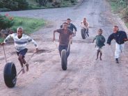 Children being instructed in focus, balance, physics and joy. 