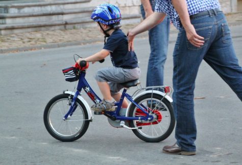 teaching child to ride a bike without training wheels