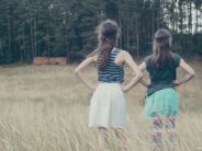 Where Does Kid Confidence Come From? unsplash girls outside from behind