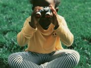 unsplash af am girl with binoculars