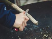 kid hand with knife whittle markus-spiske-AAtPYCeUk0Q-unsplash