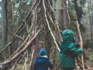 50 Things Even Digital Kids Might Love to Do Outside kids building teepee unsplash markus-spiske-1S0-pHmQ-TY-unsplash